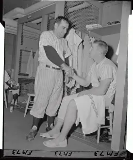 Mickey Mantle and Yogi Berra Shaking Hands in Locker Room