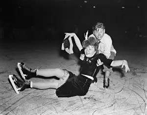 Mickey Rooney Helping Nancy Carroll