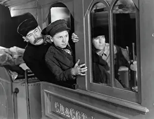 Mickey Rooney, Lee Phelps, and Mitchell Lewis Riding on Train