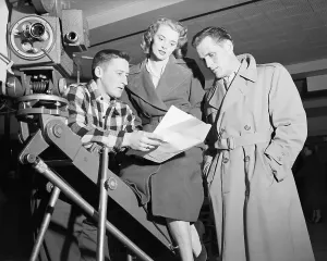 Script Prints: Mickey Spillane Goes Over Script W/Actor