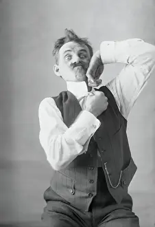 Problem Prints: Middle-aged man adjusting collar. August 11, 1925