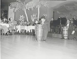 Midget Playing with Band at the El Morocco