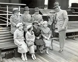 Eight Midgets Posing on Bench