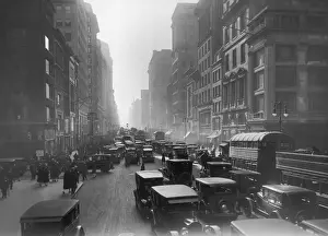 Sidewalk Prints: Midtown NYC; Cars, buses, and pedestrians crowd the streets and sidewalks