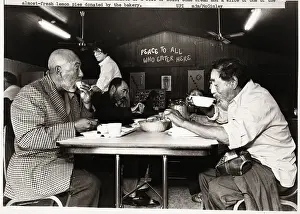Migrant Farmers Eat Soup at Soup Kitchen