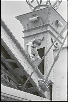 Mike Dingus Sitting Atop Bridge