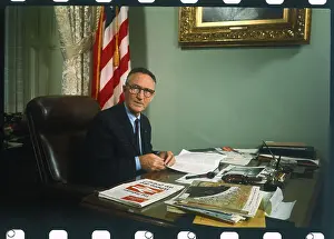 Mike Mansfield Sitting at Desk