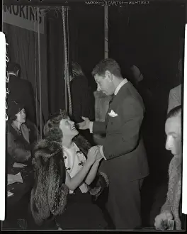 Mike Romanoff Holding Dixie Dunbar's Hand