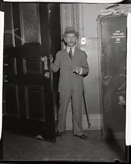 Guilt Prints: Mike Romanoff Standing at Door