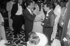 Acapulco Prints: Mike Todd and Liz Taylor Hug at Wedding