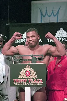 Mike Tyson Flexes Muscle on Scale