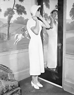 Trying On Prints: Mildred Babe Didrickson Trying on Hat