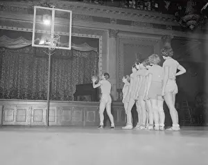Prints of (Original Caption) Hoops Through Time: A Visual Journey of Basketball History: Mildred Didrickson Standing in Basketball Practice Line
