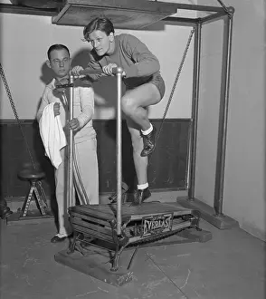 Jogging Prints: Mildred Didrickson Using Exercise Machine with Artie McGovern
