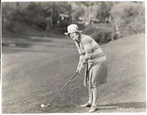 Mildred Harris Shown Golfing