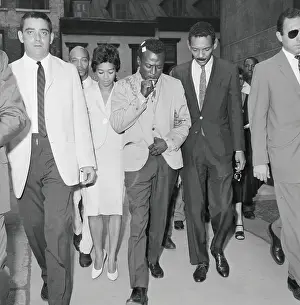 Exiting Prints: Miles Davis and Colleagues Exiting Courtroom