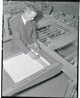 Miles Nelson Operating a Calculator