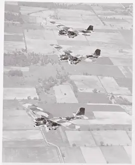 Military Airplanes in Flight over Land Areas