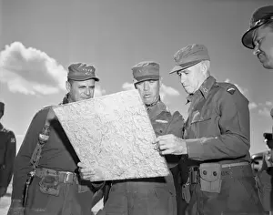 Military Generals Looking at Map