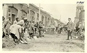 Armenian Prints: Military Man Directs Highway Workers