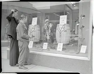 Kansas Prints: Military Men Gazing into Windows for Civilian Attire