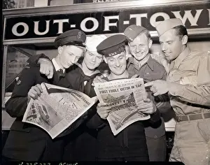 Invasion Prints: Military Men Reading Paper
