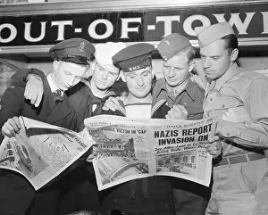 Invasion Prints: Military Men Reading Paper