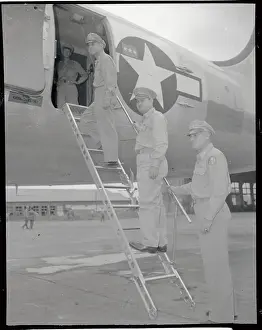 Military Officers Boarding Plane