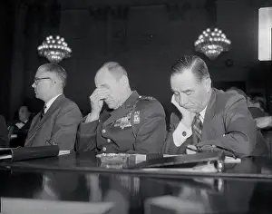 Pressure Prints: Military Officials Sitting and Looking Worried