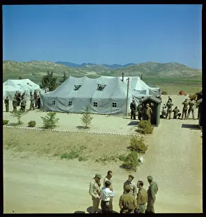 Military Officials Standing Near Tents