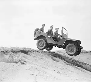 Jeep Prints: Military Personnel Driving Jeep down Dunes
