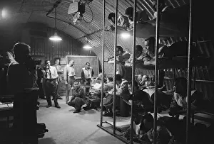 Shelter Prints: Military Volunteers Relaxing in Bomb Shelter