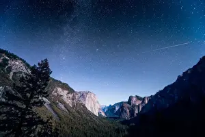 The Milky Way over El Capitan and Half Dome Mountain from Tunnel VIew, Yosemite National Park, California, United States