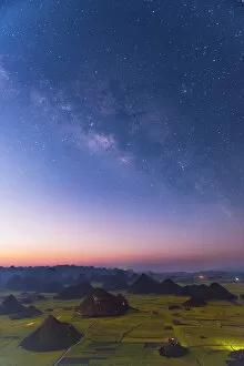 Yunnan Province Collection: Milky way over the yellow fileds