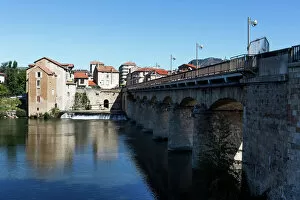 Images Dated 7th August 2016: Millau / France - old town and historic bridge crossing Tarn River