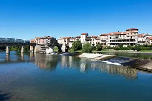 Millau / France old town at Tarn River - The Millau Viaduct (for what this city is mostly known) in background