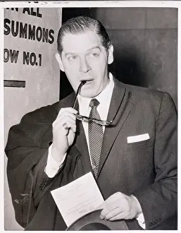 Milton Berle Chewing on His Glasses
