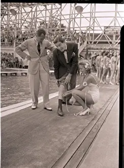 Milton Berle Gets Measured by Grayce Reilly