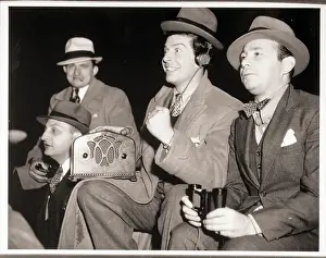 Headphones Prints: Milton Berle Listens to Radio at Fight