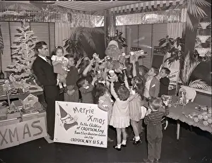 Milton Berle Playing Santa for Children