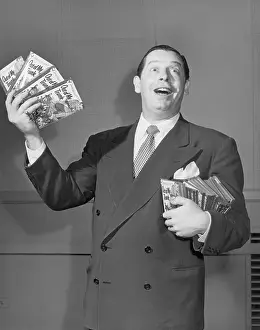 Milton Berle Posing With Joke Books