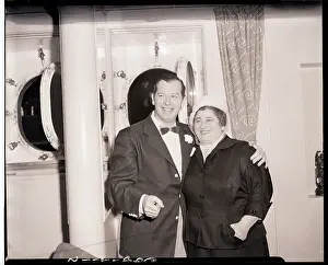 Arm Around Shoulder Prints: Milton Berle Standing with a Woman