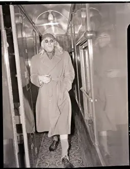 Cross Dresser Prints: Milton Berle Walking Down Corridor