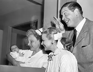 Nursery Prints: Milton Berle Waves to Infant in Nursery