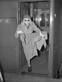 Cross Dresser Prints: Milton Berle Wearing Wig and Pointing to Shoe