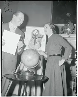 Milton Caniff Showing Sketch of Gown