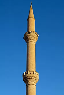 Images Dated 15th May 2011: Minaret of a mosque protruding into the blue sky, Goreme, Cappadocia, Turkey