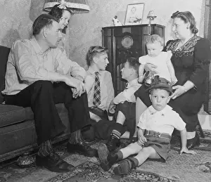 Miner and His Family Listening to President Franklin D. Roosevelt