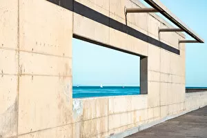 Images Dated 16th December 2019: Minimal urban architecture aligned with blue sea horizon