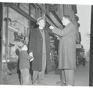 Minister and Young Boy Being Stopped by Reporter